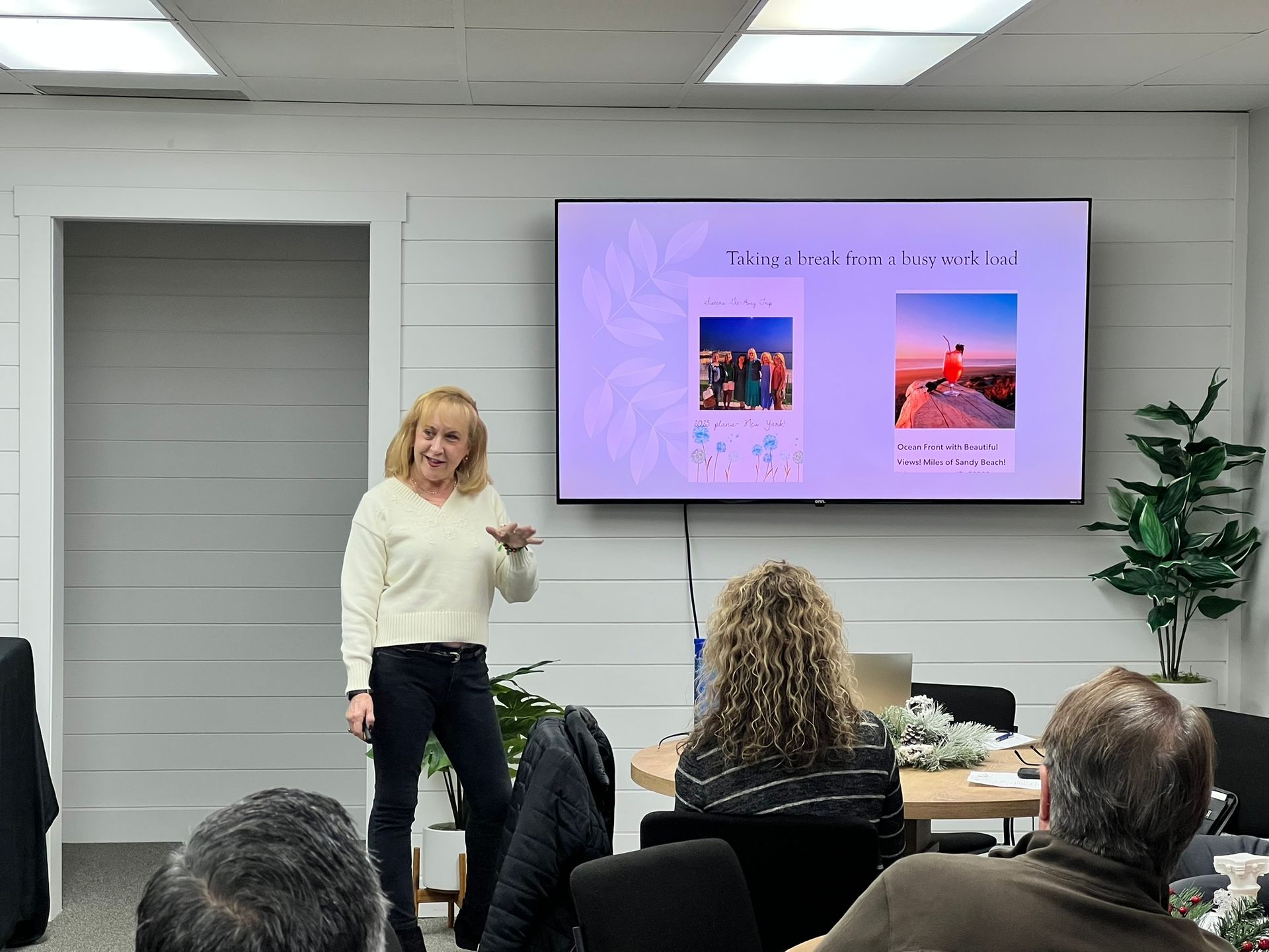 Photo of Kathy Wright giving her award-winning presentation in front of the Gig Harbor Pillars Group. 