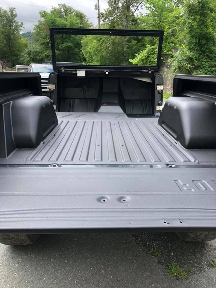 Back of a vehilce with a spray-on bedliner
