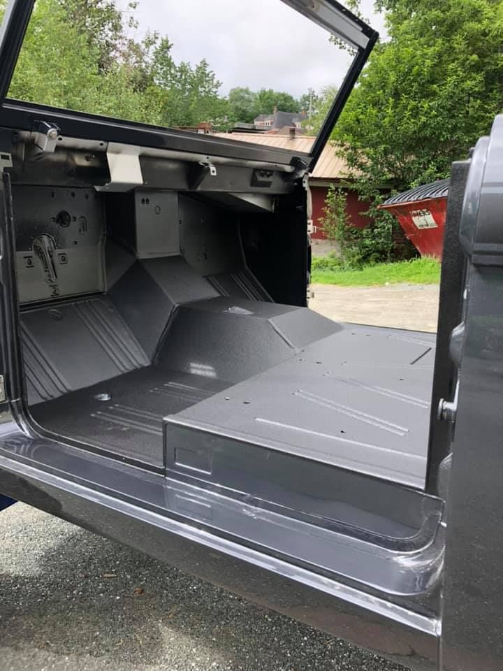 Spray-on bedliner in a vehicle