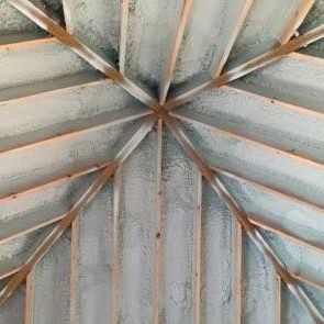 Spray foam in the rafters of a building
