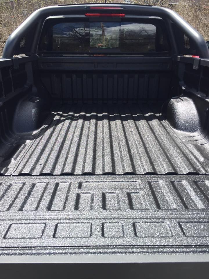 Spray-on bedliner in a truck bed