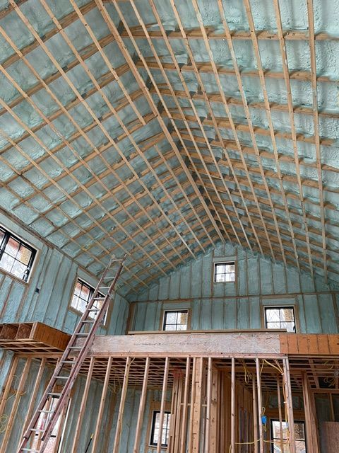 Closed Cell Spray Foam Insulation being applied to the walls and ceiling