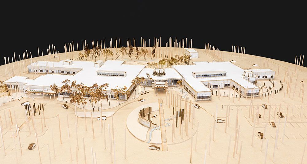 A model of a large building in the middle of a forest for NHCN Nanatawiwekamik Health Centre.