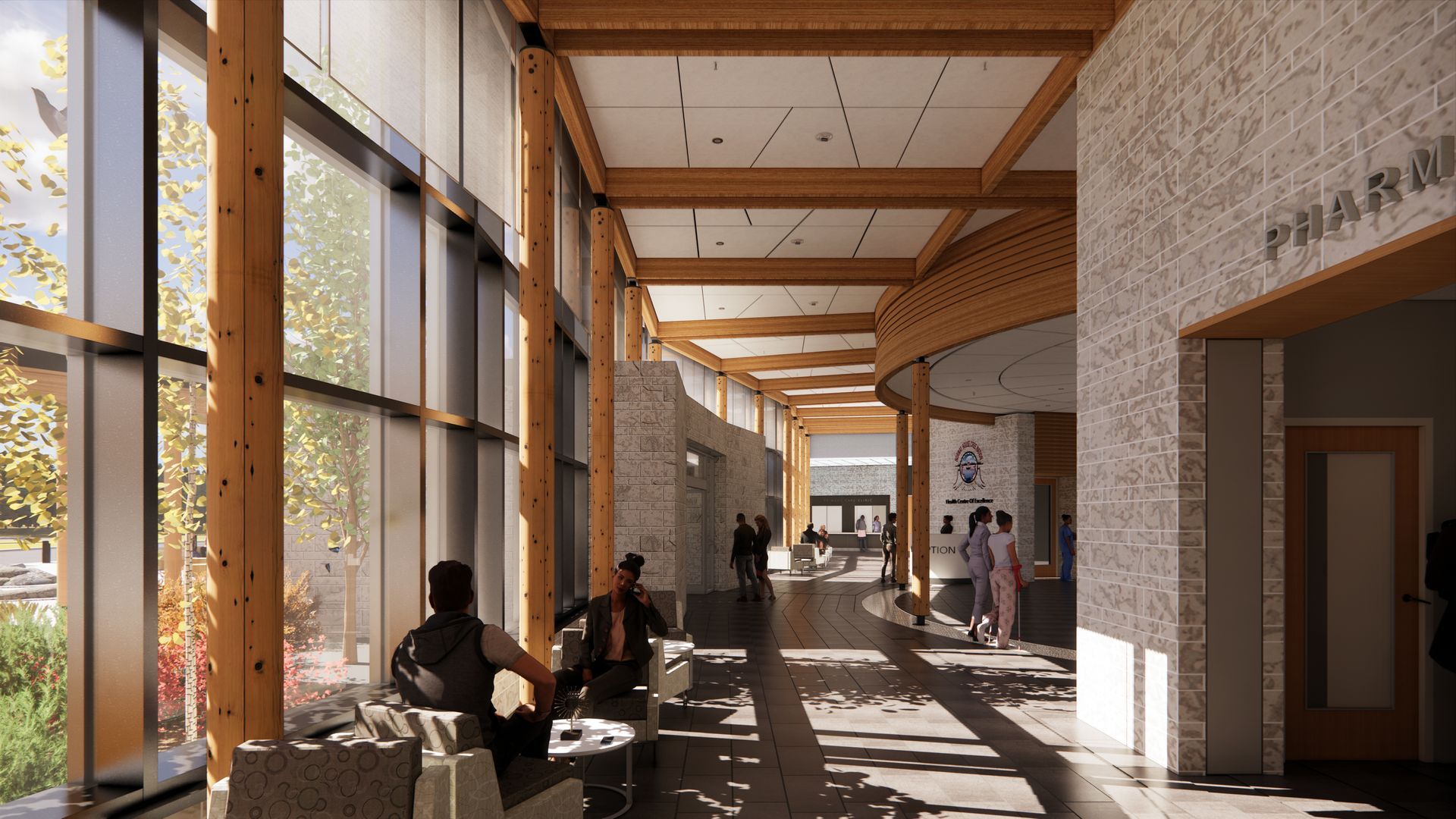 Draft of NHCN Nanatawiwekamik Health Centre and a group of people are sitting in a long hallway in a building.