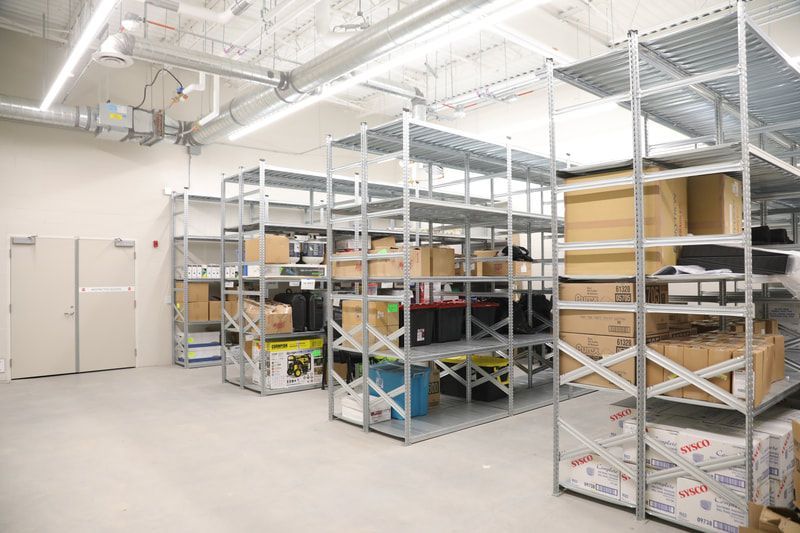 A warehouse filled with lots of shelves and boxes.