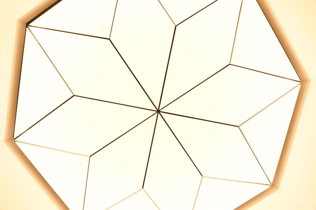 A close up of a geometric shape that looks like a snowflake