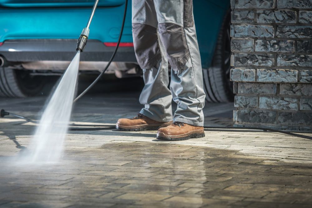 Cleaning Using Pressure Washer — Porta-Vac in Cannonvale, QLD