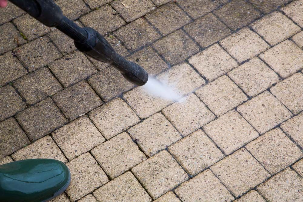 High-Pressure Water Jet Outdoor Floor Cleaning — Porta-Vac in Moranbah, QLD