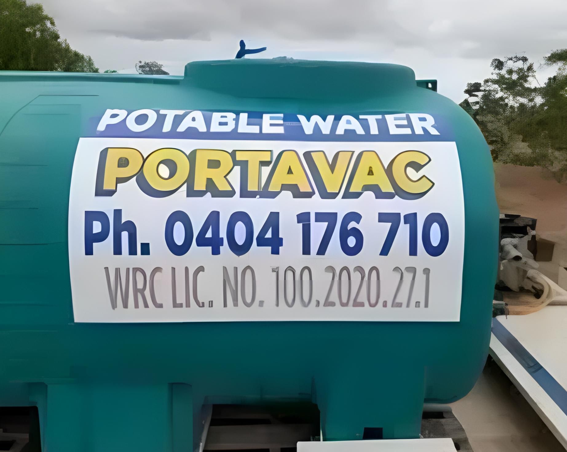 A Portavac Water Cart Hire Truck Is Parked In The Dirt — Porta-Vac in Moranbah, QLD