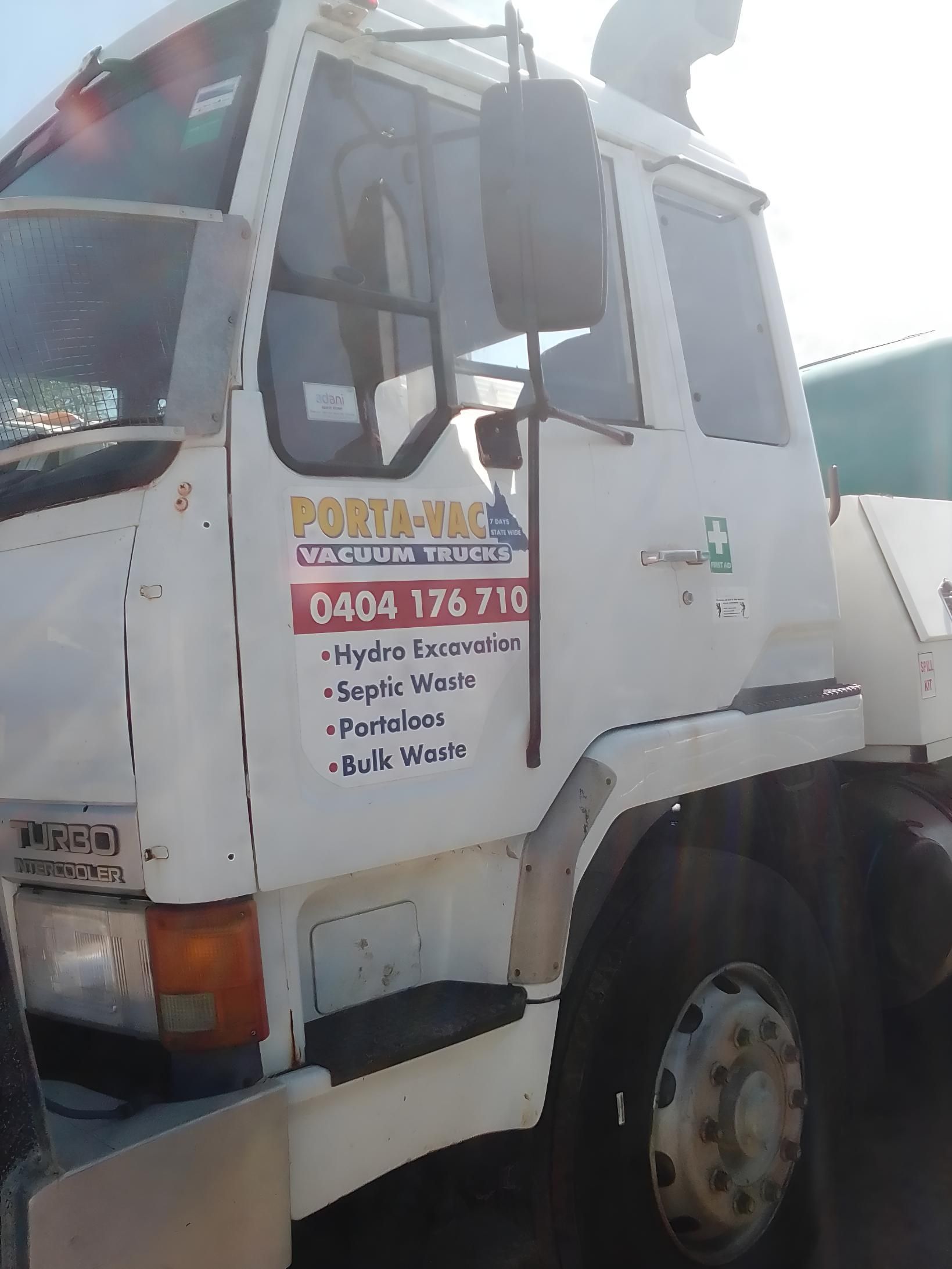 A White Truck With A Sticker On The Side That Says Pontoon — Porta-Vac in Proserpine, QLD
