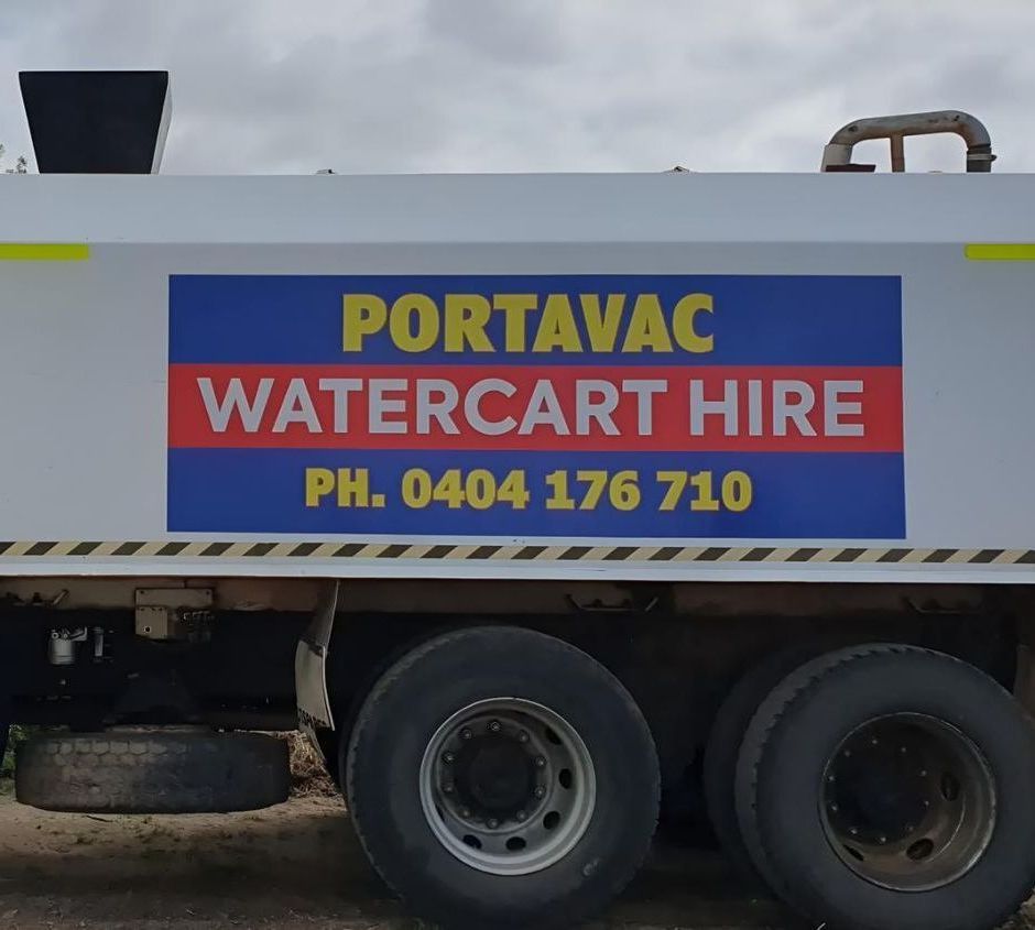 A White Truck With a Sign That Says Portavac Watercart Hire — Porta-Vac in Bowen, QLD