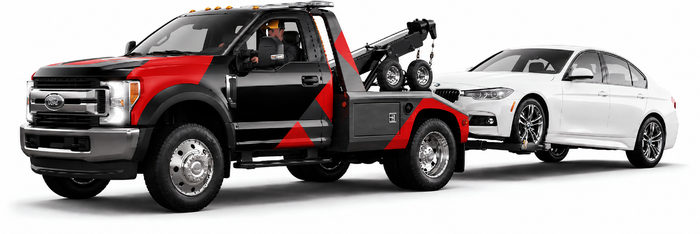 Red and black pickup truck towing a white sedan on a trailer