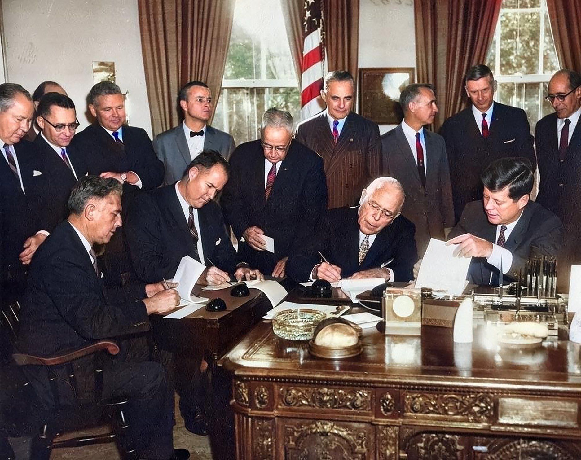 President Kennedy signs the Delaware Basin Compact, creating the Delaware River Basin Commission in a ceremony at the White House.