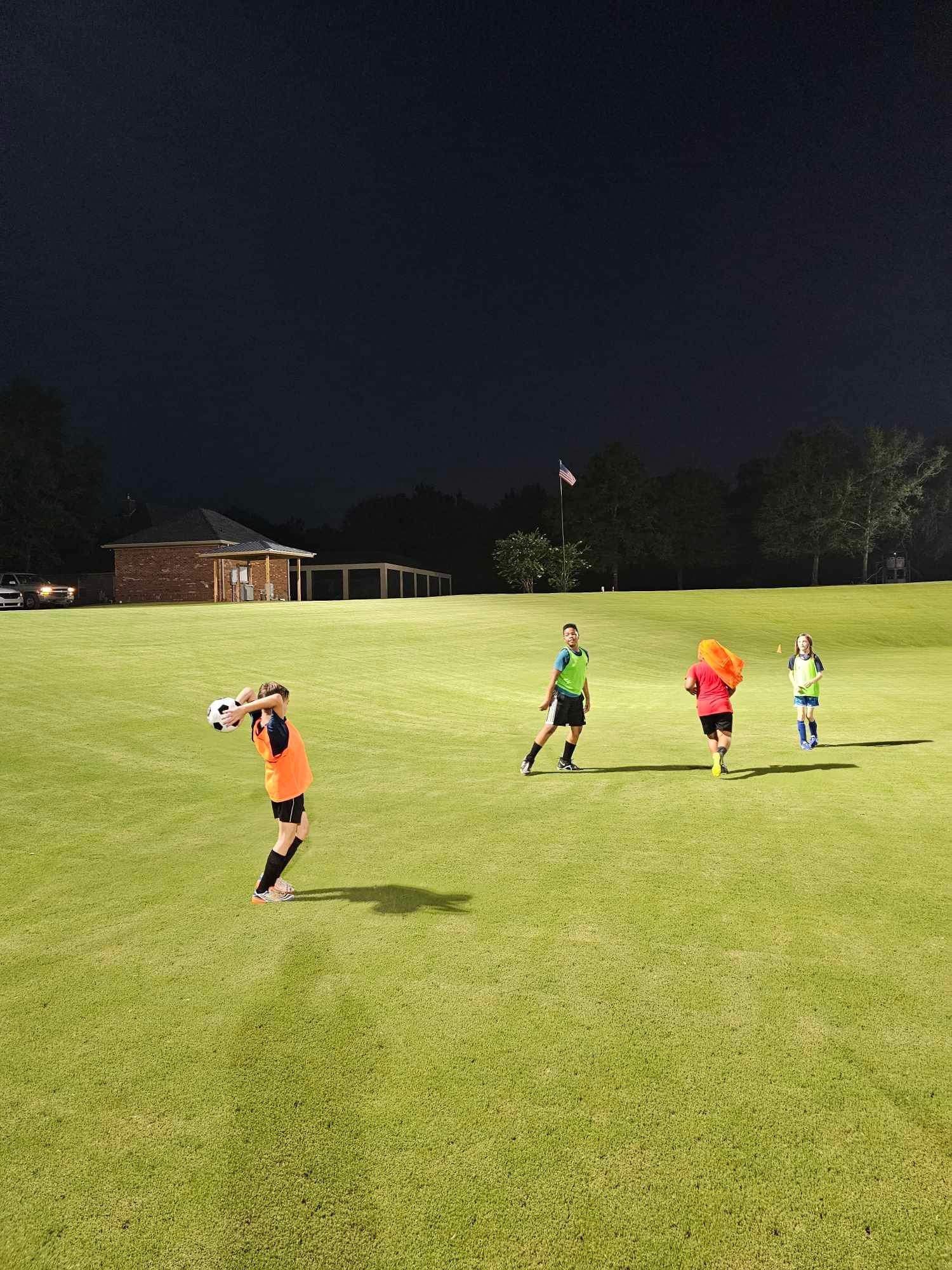 Athletes playing on the outdoor field at Foundry Athletics