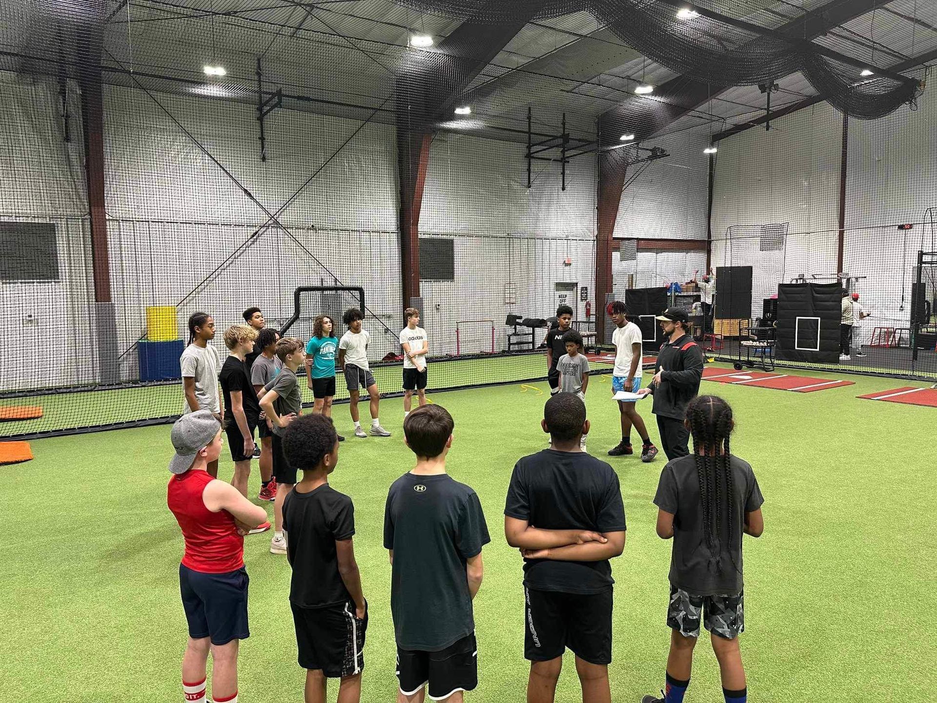 Athletes listening to coaching inside Foundry Athletics