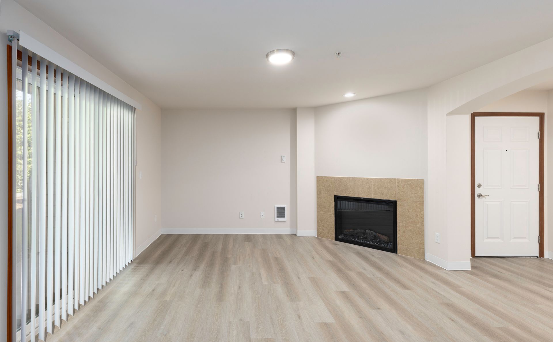 Photo of a living room with a fireplace