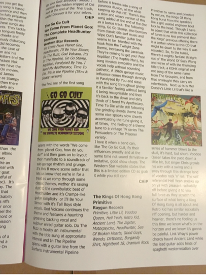 A magazine is open to a page that says cd cd cut