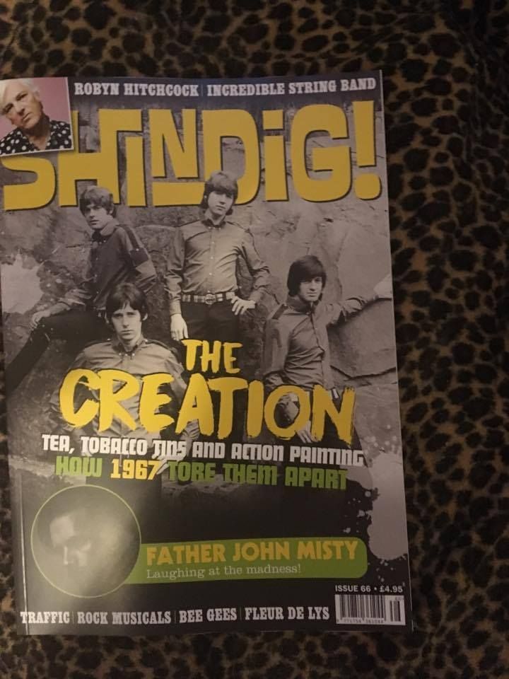 The cover of a magazine that says the creation
