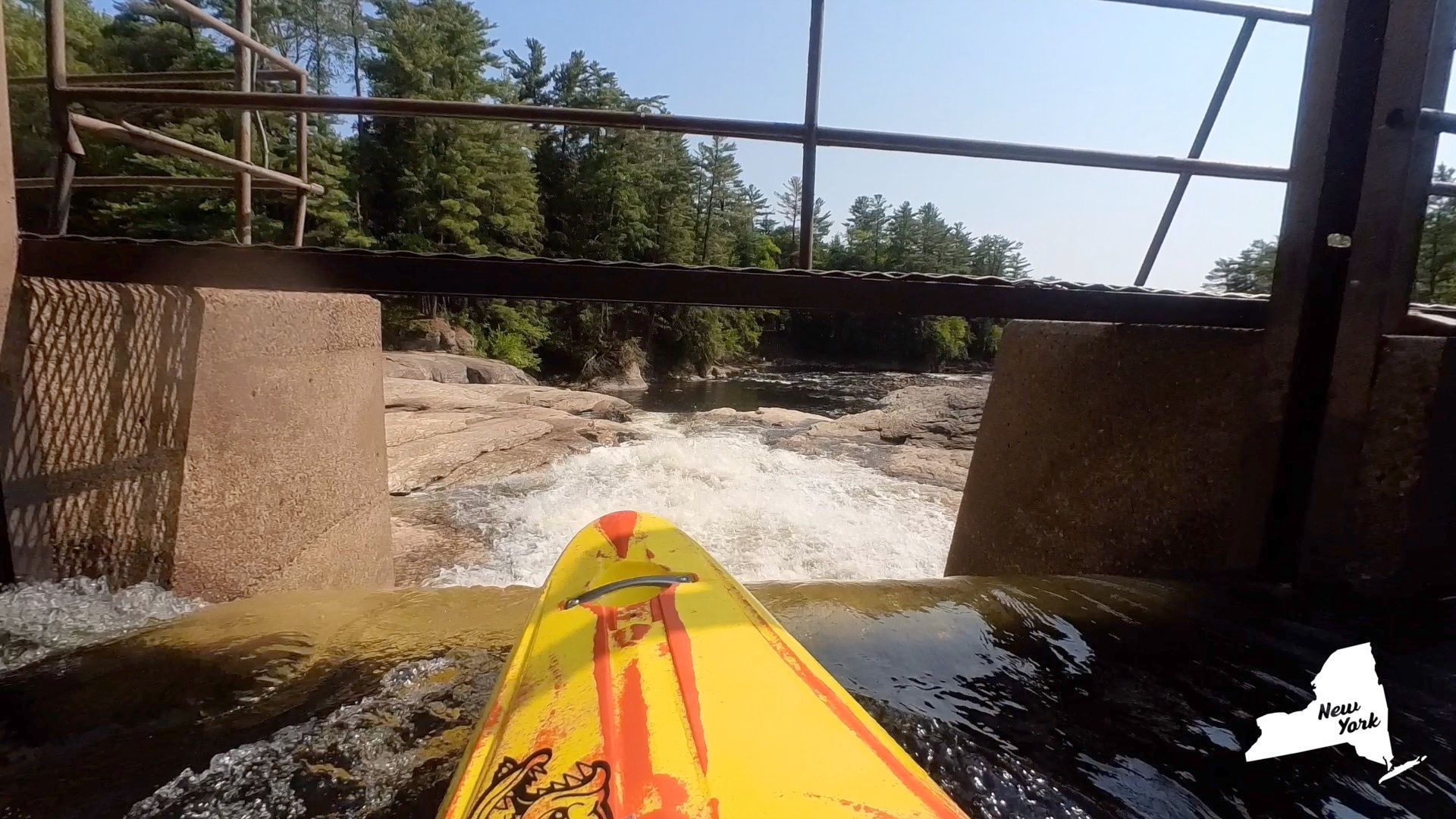 garrett scott kayaking over crypto rapid