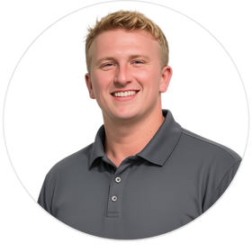 Smiling man in a dark gray polo shirt on a white background