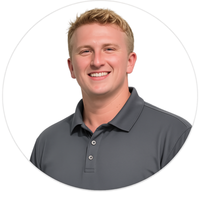 Smiling man in a gray polo shirt on a white background