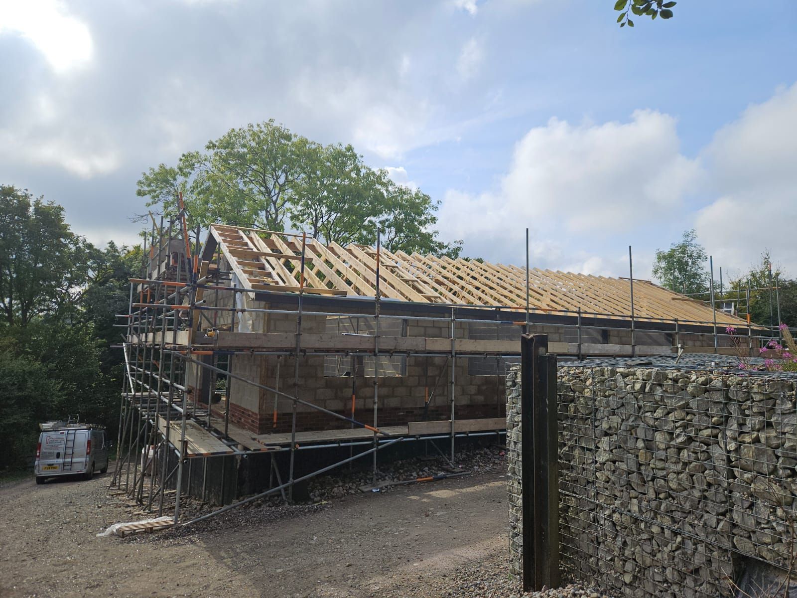 A building is being built with scaffolding around it.