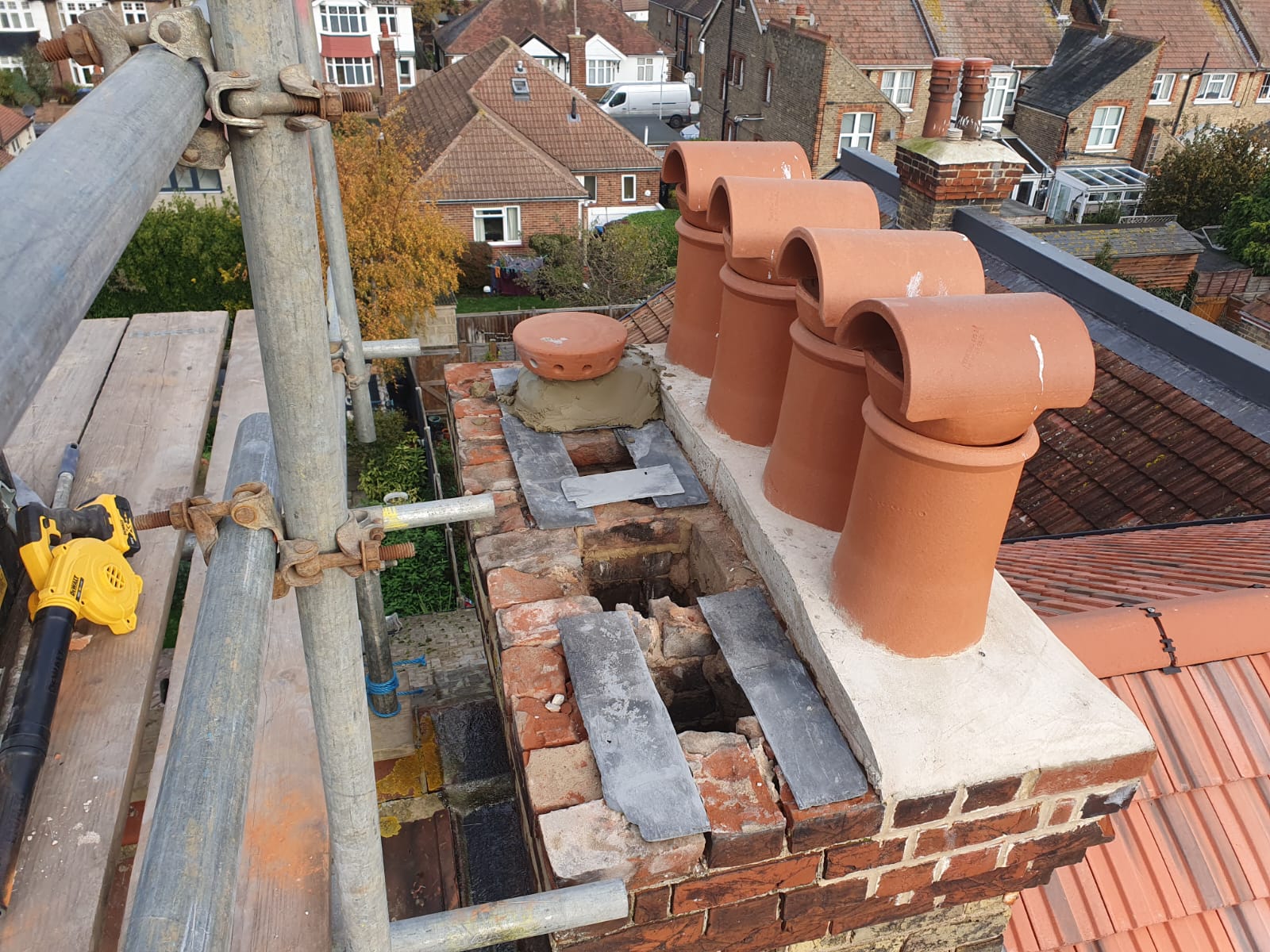 Roofer working on a pitched roof on a Kent property