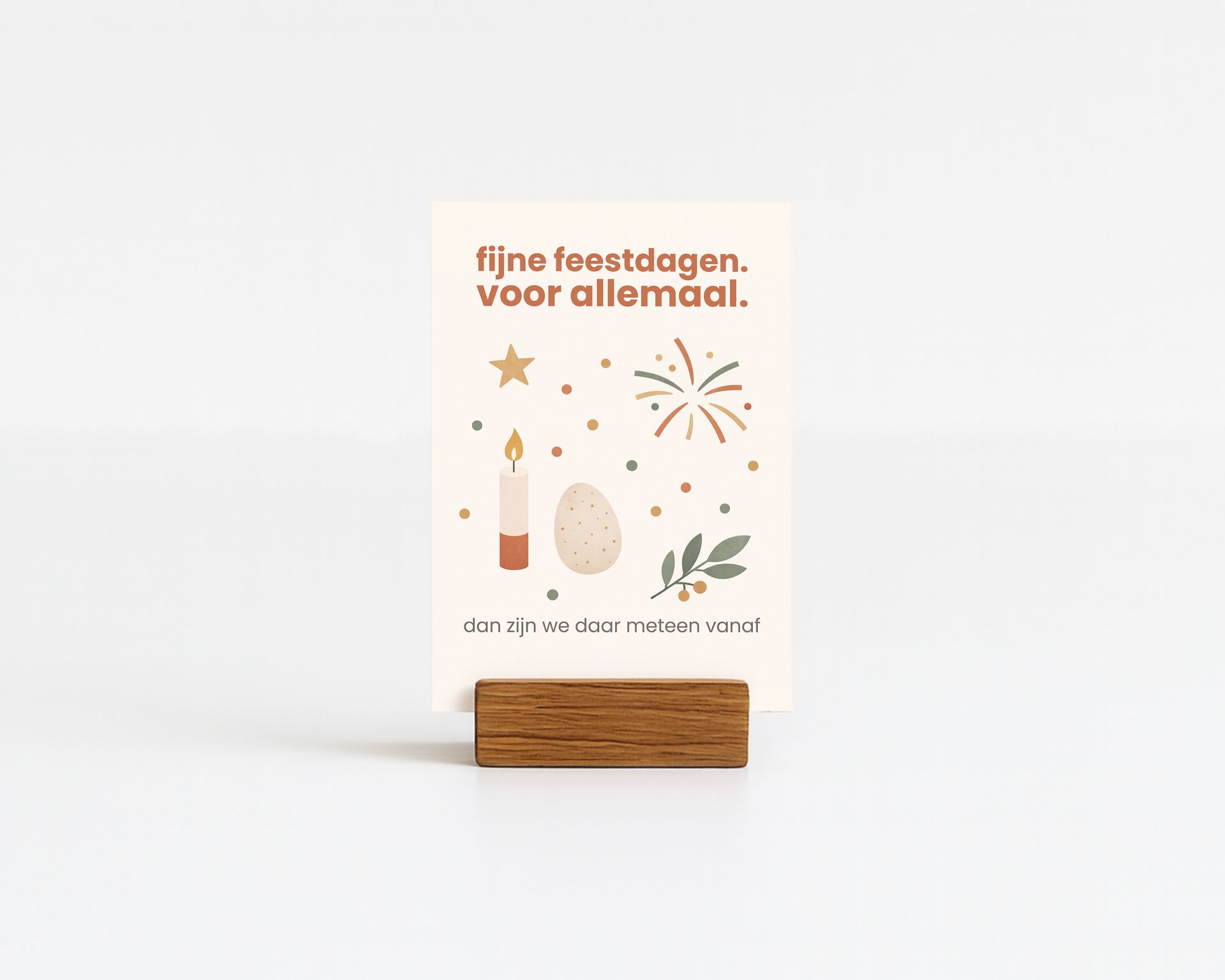 Card in wooden holder with holiday greetings and illustrations: candle, egg, fireworks.