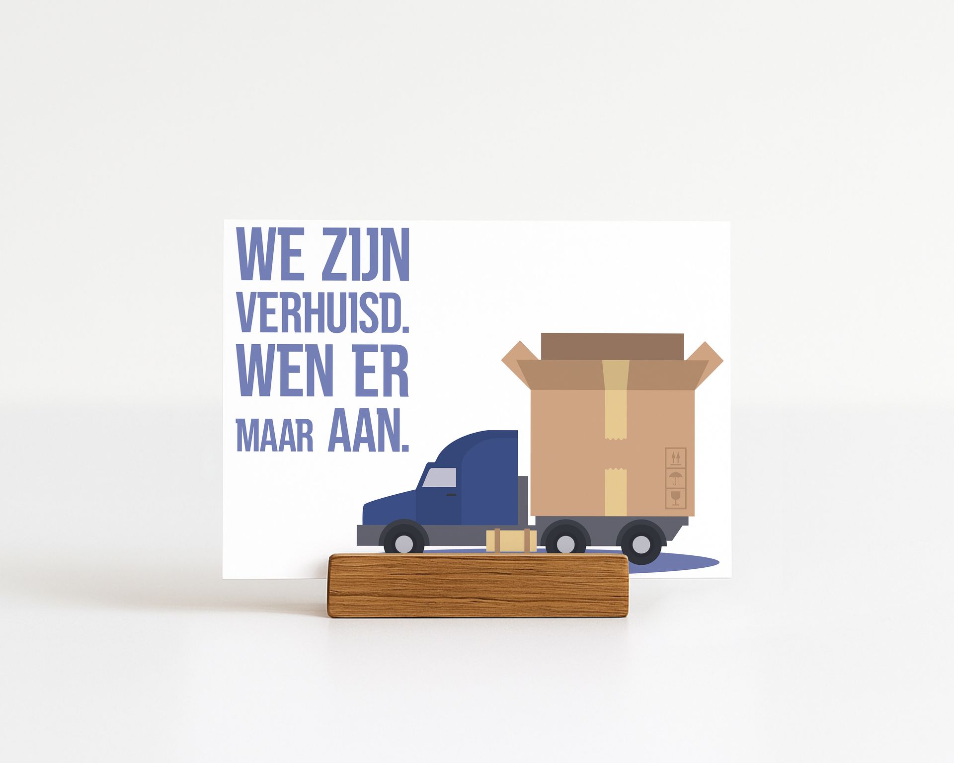 Blue truck carrying cardboard box on a card, text: