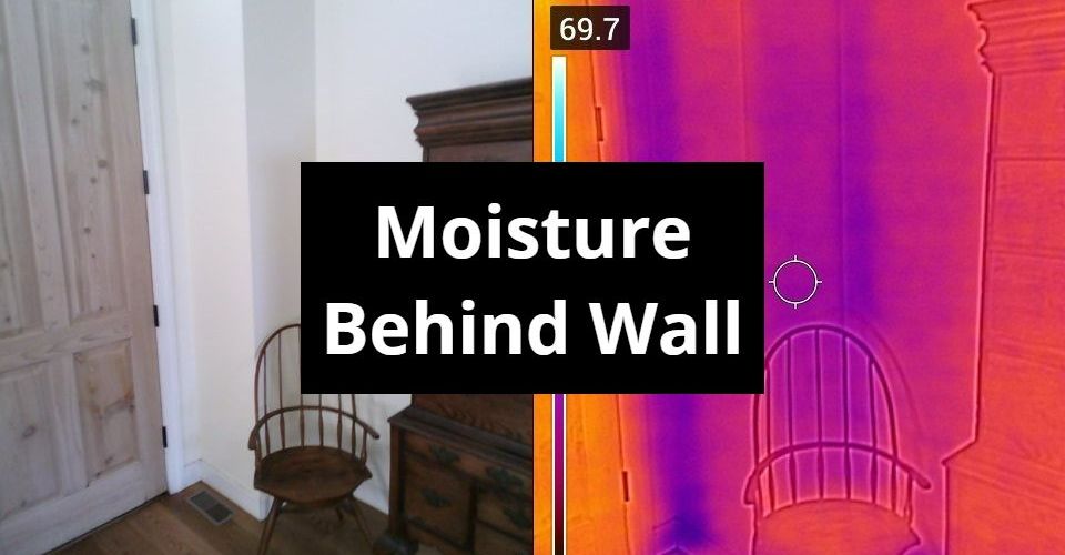 A picture of a room with a sign that says moisture behind wall