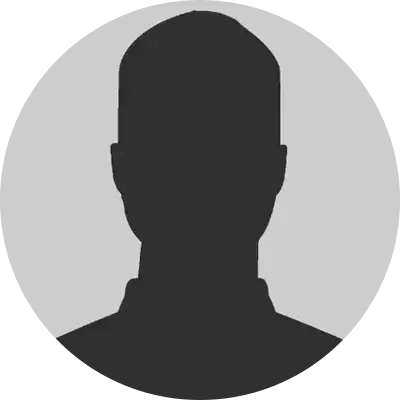 A silhouette of a man 's head in a circle.