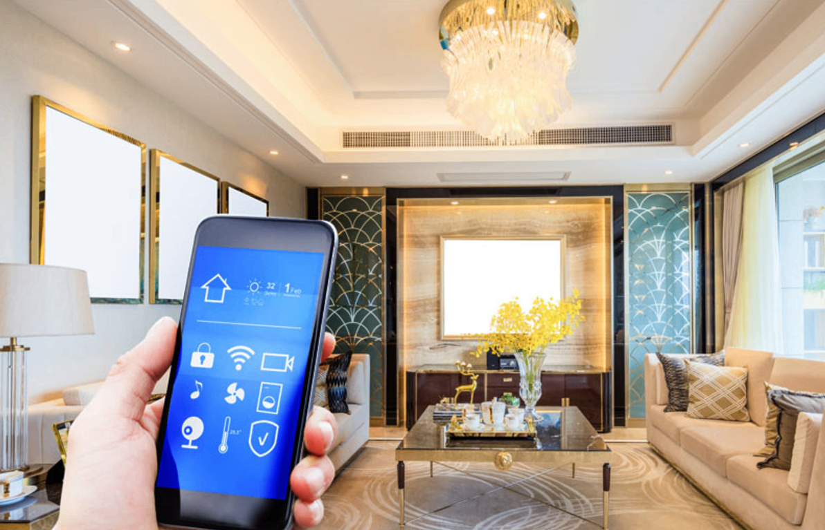 Hand holding a smartphone controlling smart home devices in a bright luxury living room