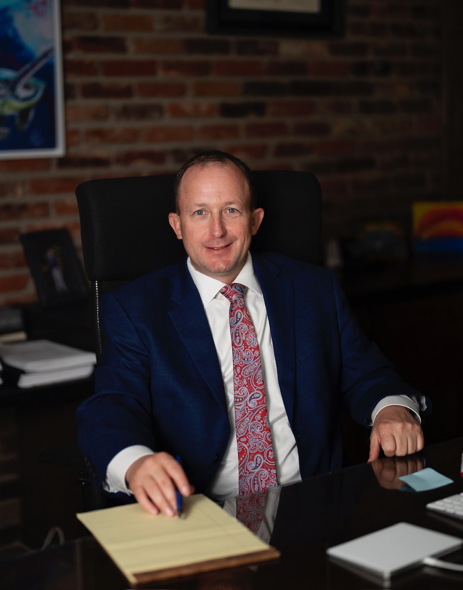 Will Blocker at his desk