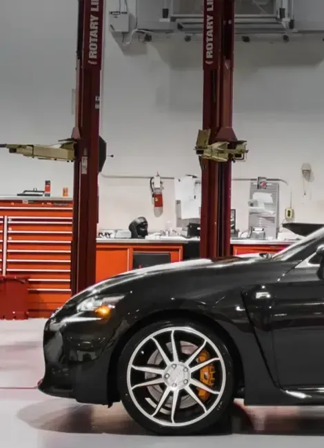 Upclose to Black Car in Garage | Asian Imports Garage