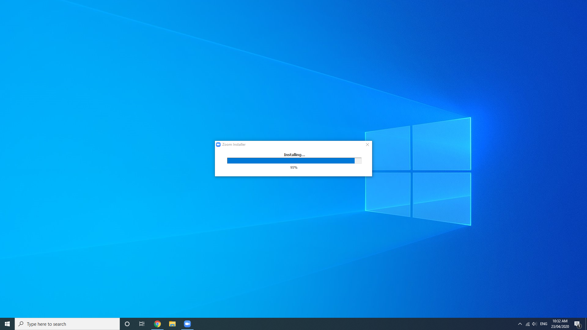 Windows 10 desktop with a centered loading/progress dialog over the blue wallpaper.