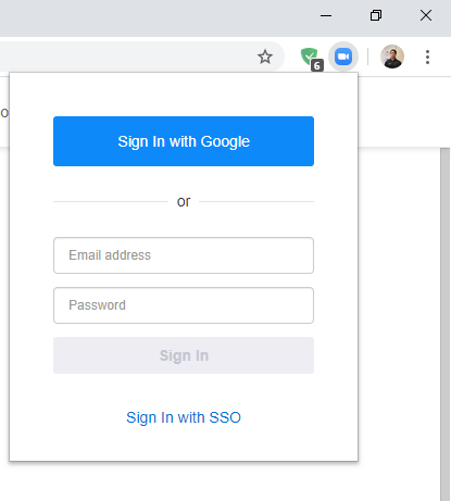 Login popup with blue “Sign in with Google” button, email and password fields, and an SSO link