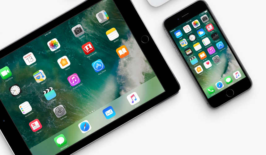 Tablet and smartphone displaying app icons on white background