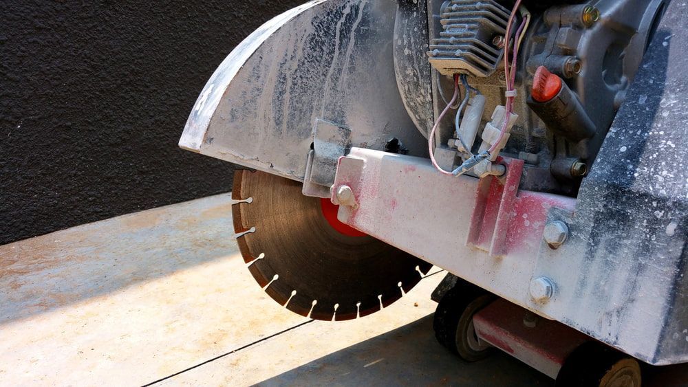 A Concrete Saw Is Cutting A Piece Of Concrete — Pro Cut N Core In Manunda, QLD