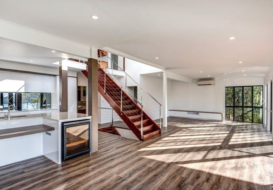 There is a Staircase in the Middle of the Room — Coral Coast Building & Management in Cannon Valley, QLD