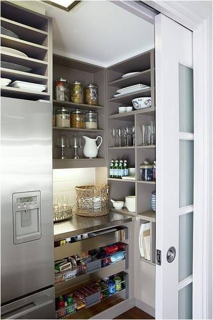 A Pantry in a Kitchen With a Sliding Glass Door — Coral Coast Building & Management in Cannon Valley, QLD