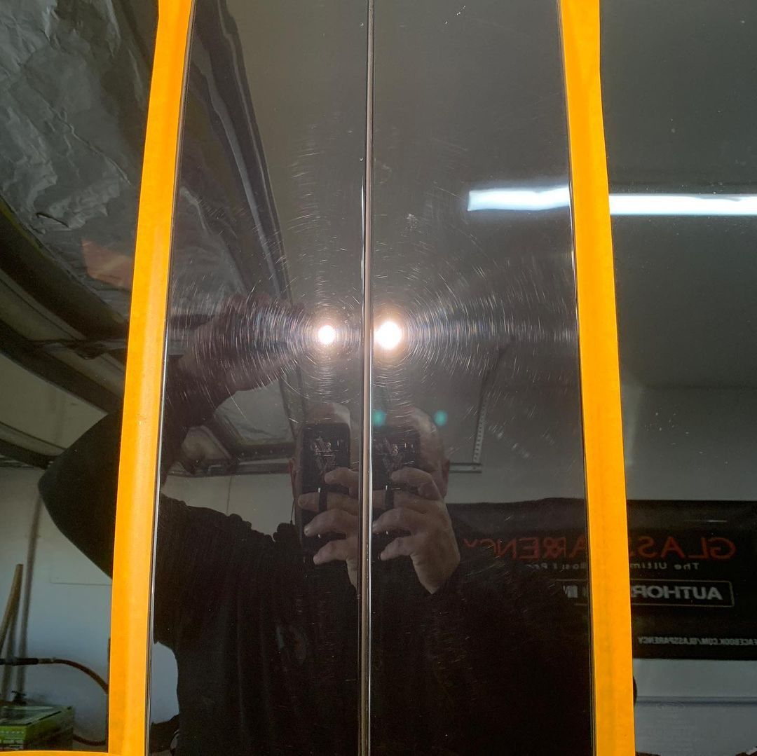 a person is taking a picture of themselves in a mirror