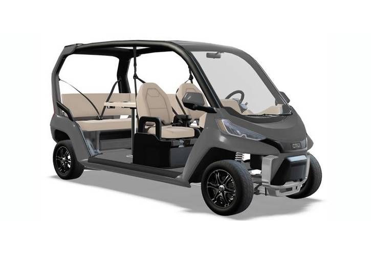 Compact gray open-sided electric shuttle with beige seats on a white background