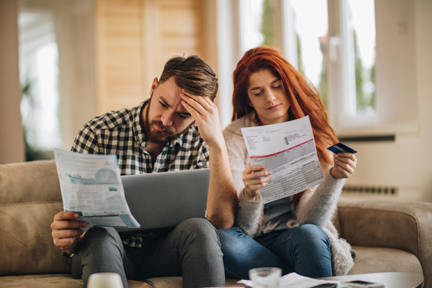 People reading a high water bill