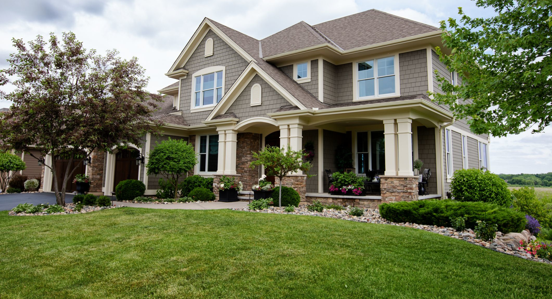 A home and landscaped front yard