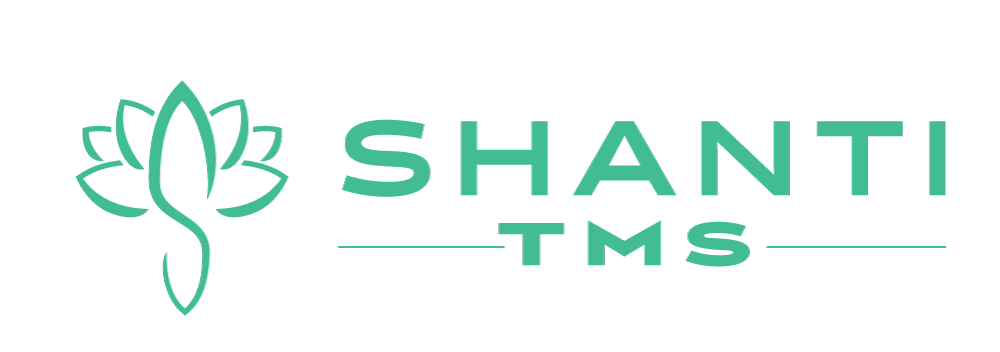 A logo for shanti tms with a lotus flower on a white background.