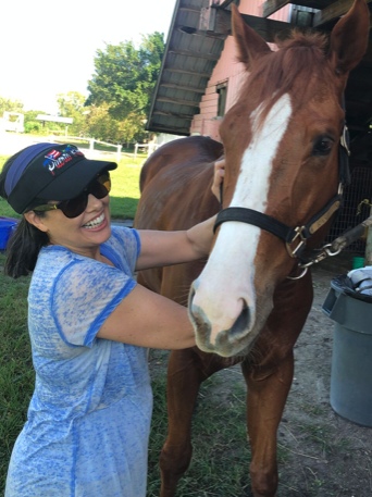 Nydia Menéndez With Horse- Fort Lauderdale, FL - Menéndez Law Firm Nydia Menéndez With Horse- Fort Lauderdale, FL - Menéndez Law Firm