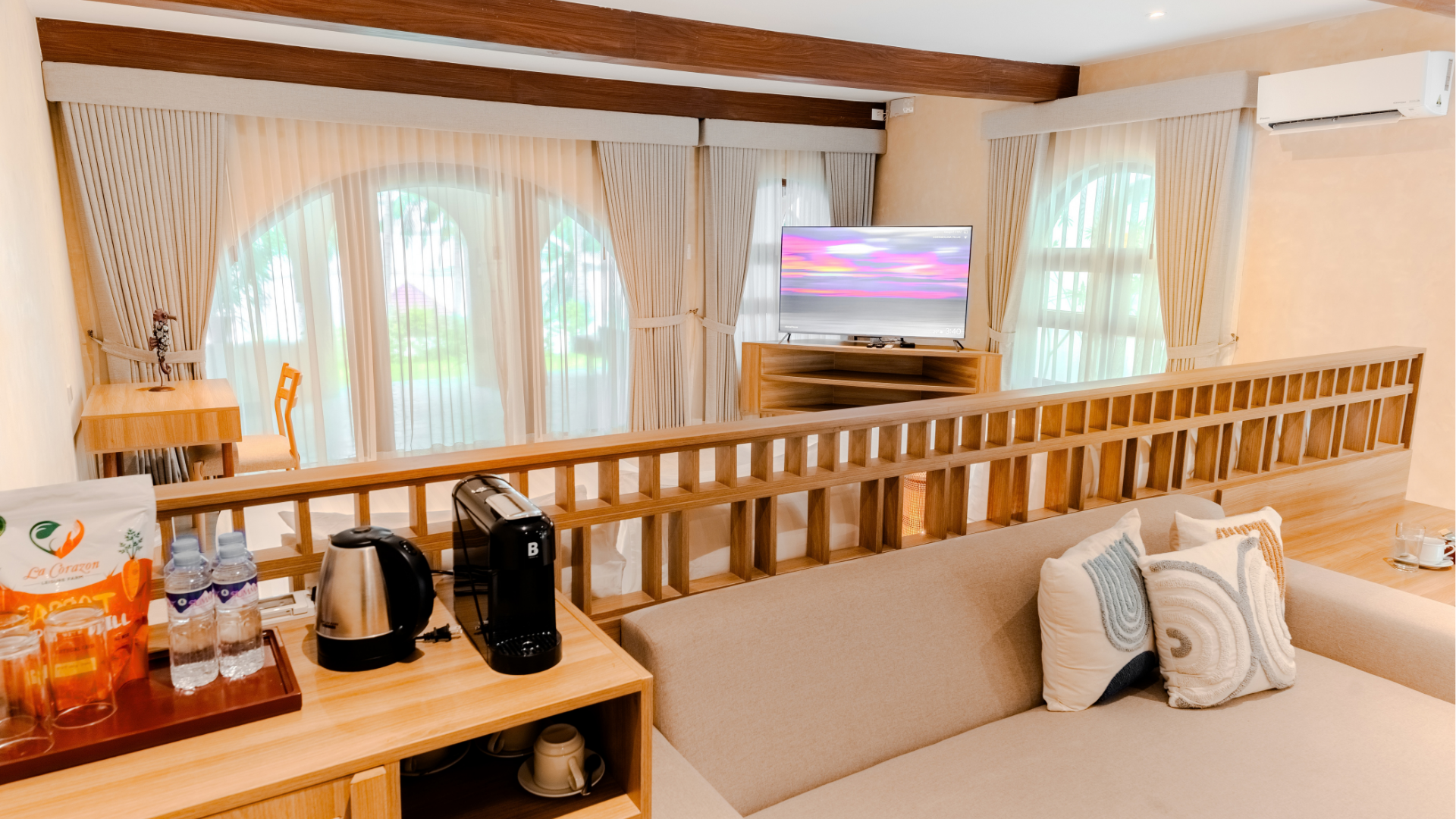 Beach Villa living area with wooden beams at Costa Solana Resort, Pagbilao, Quezon