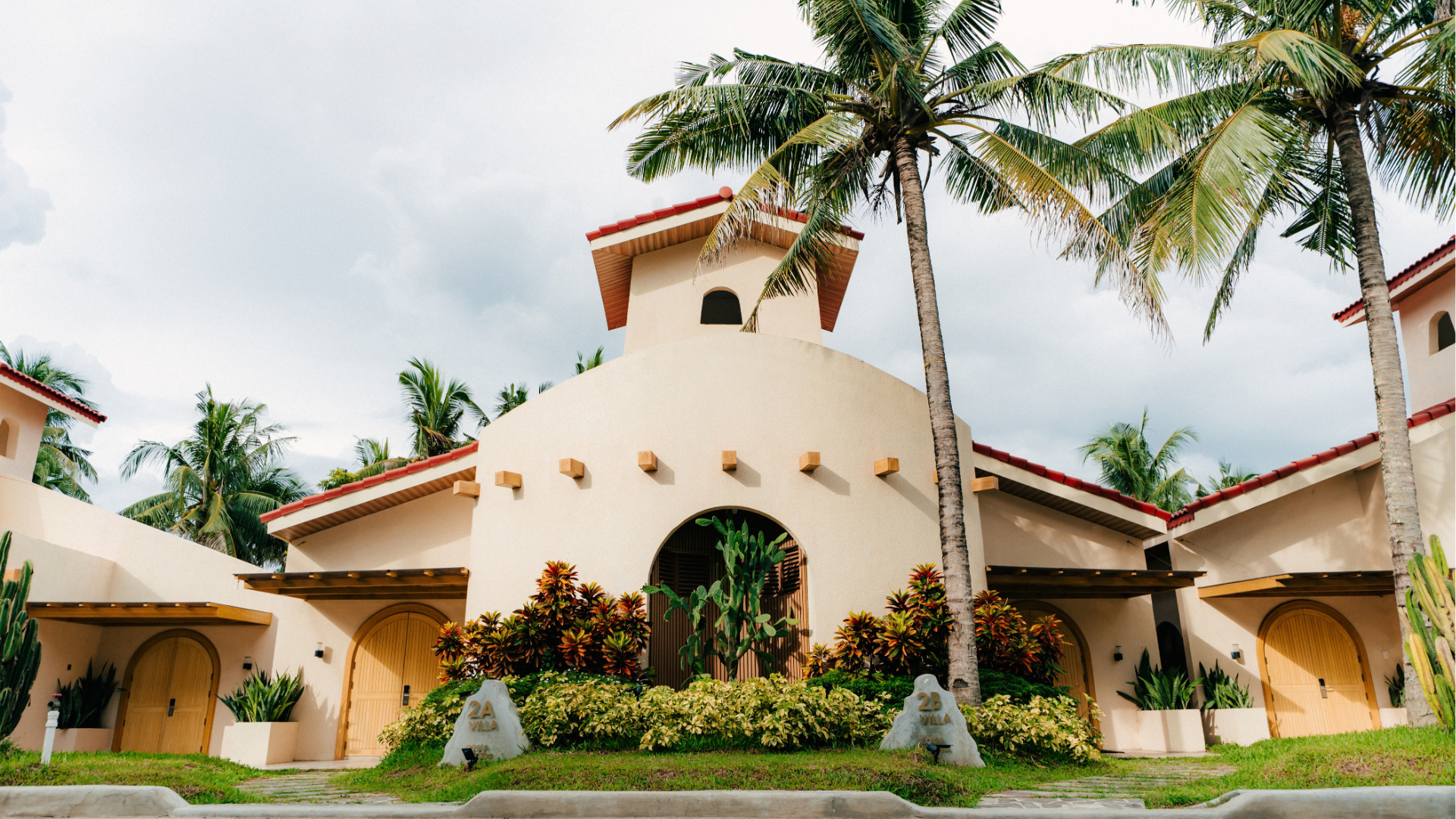 Family Beach Villa exterior facade with tropical landscaping at Costa Solana Resort, Pagbilao, Quezon