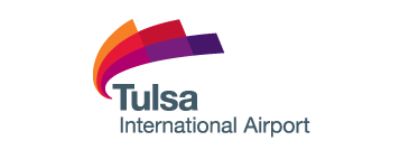 A logo for tulsa international airport with a rainbow of colors