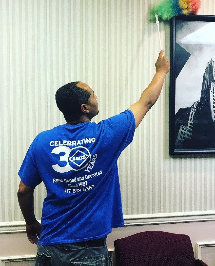 A man wearing a blue shirt with the number 30 on it